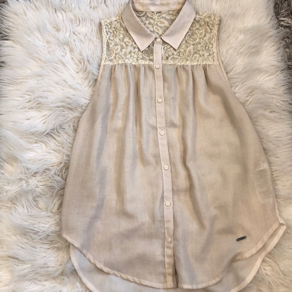 Worn couple times. Tan tank top